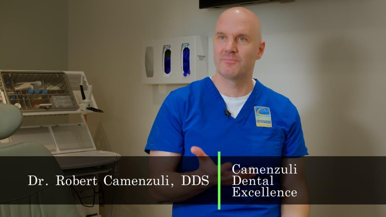 Dr. Robert Camenzuli in a treatment room, talking about anxious patients