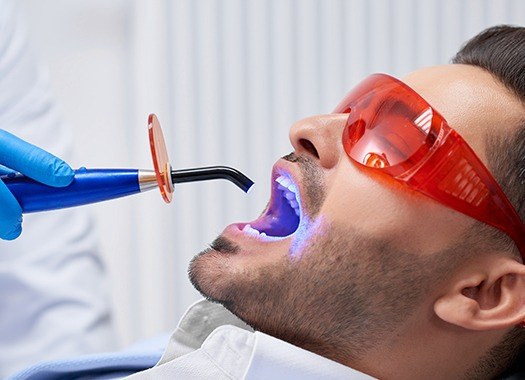 Patient receiving dental bonding