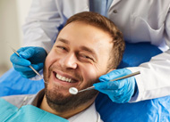 Man smiling during dental exam