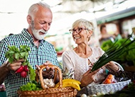 couple buying fresh fruits and vegetables 