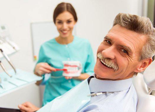 elderly man at a dental appointment 