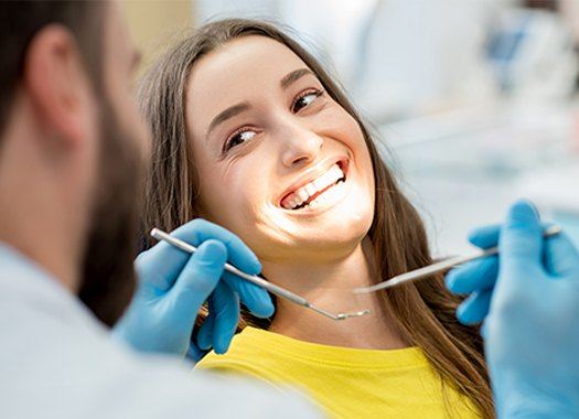 Smiling woman in dental chair