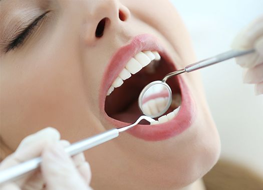 Patient receiving tooth-colored fillings