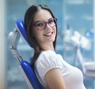 Smiling woman in dental chair