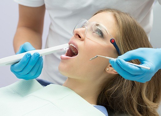 Dentist capturing intraoral images