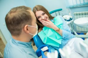 young woman at an appointment for braces removal in Uptown New Orleans 