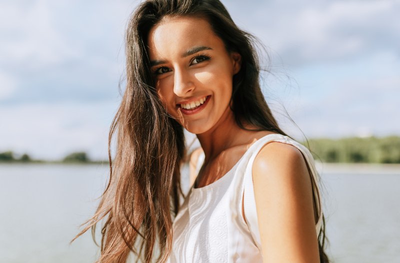 Young woman with toothy smile