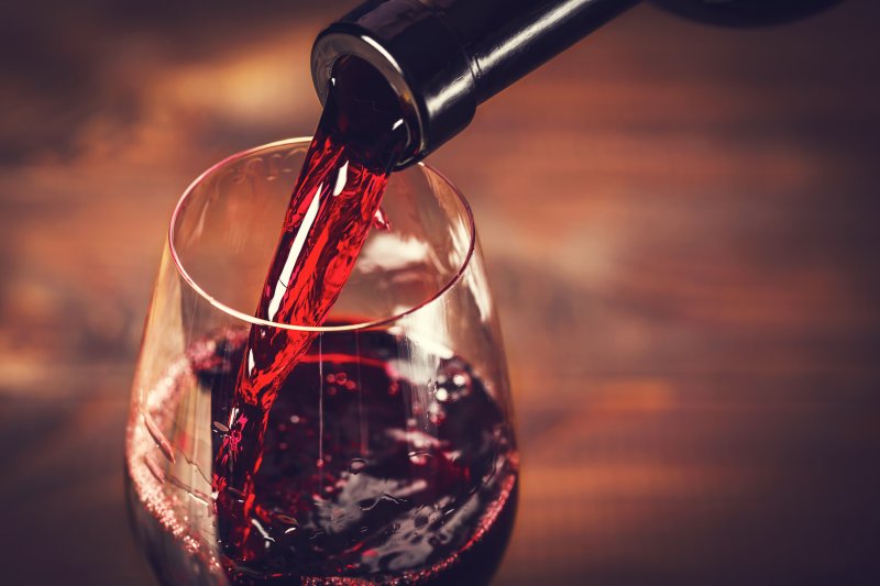 Pouring red wine